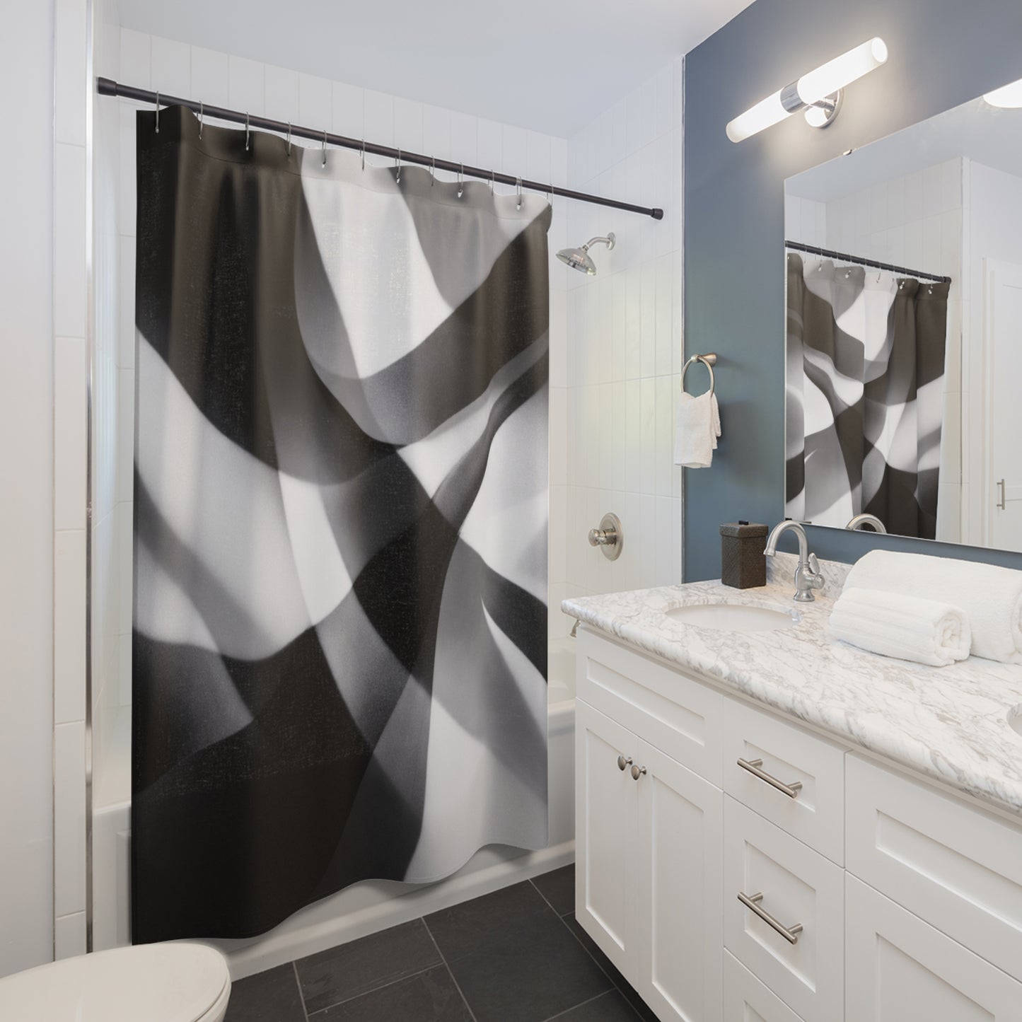 Abstract black and white waves shower curtain with modern geometric design, ideal for contemporary bathroom decor.