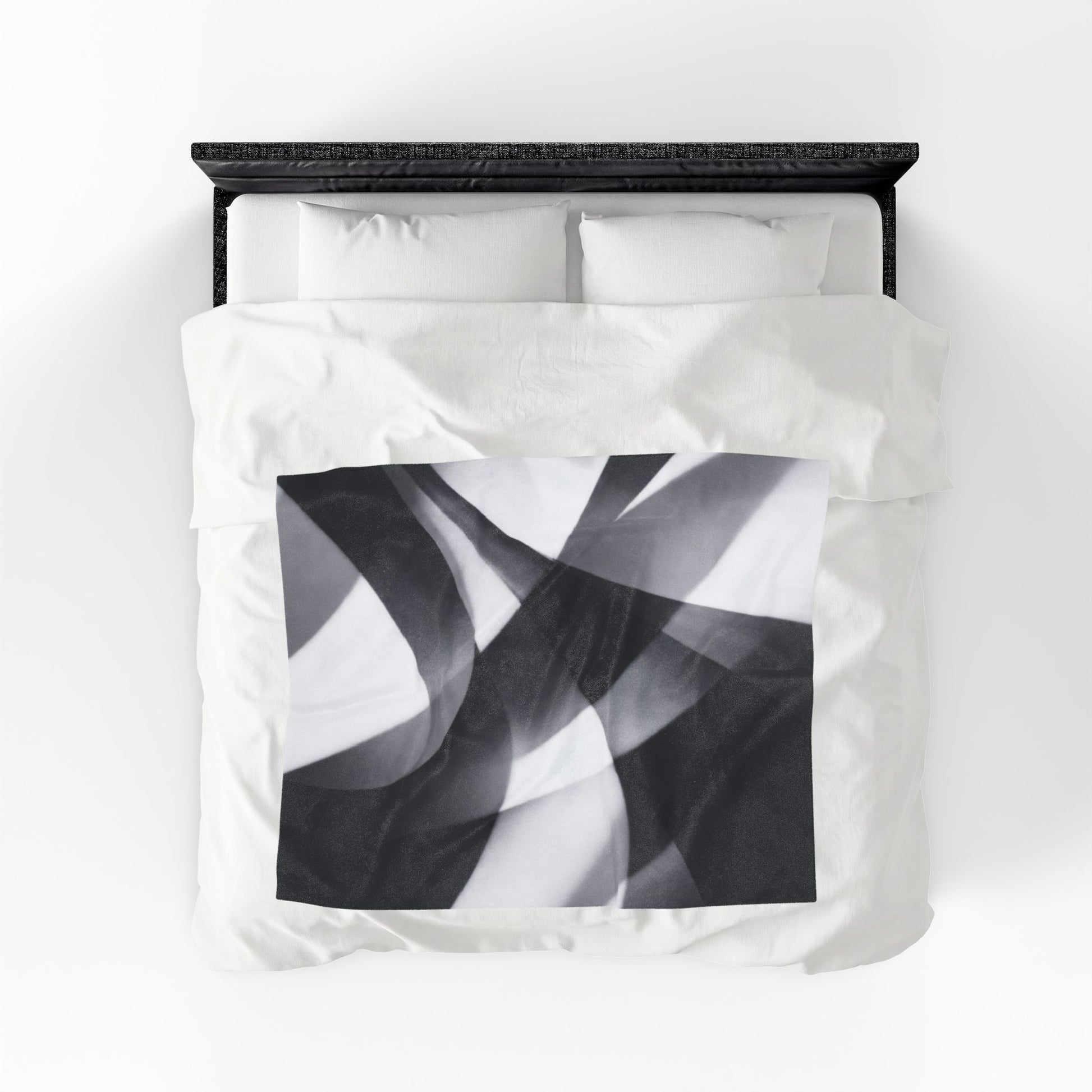Black smoke abstract velveteen plush blanket with monochrome swirl all-over print, showcasing soft, luxurious fabric and bold design.