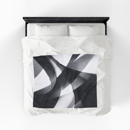 Black smoke abstract velveteen plush blanket with monochrome swirl all-over print, showcasing soft, luxurious fabric and bold design.