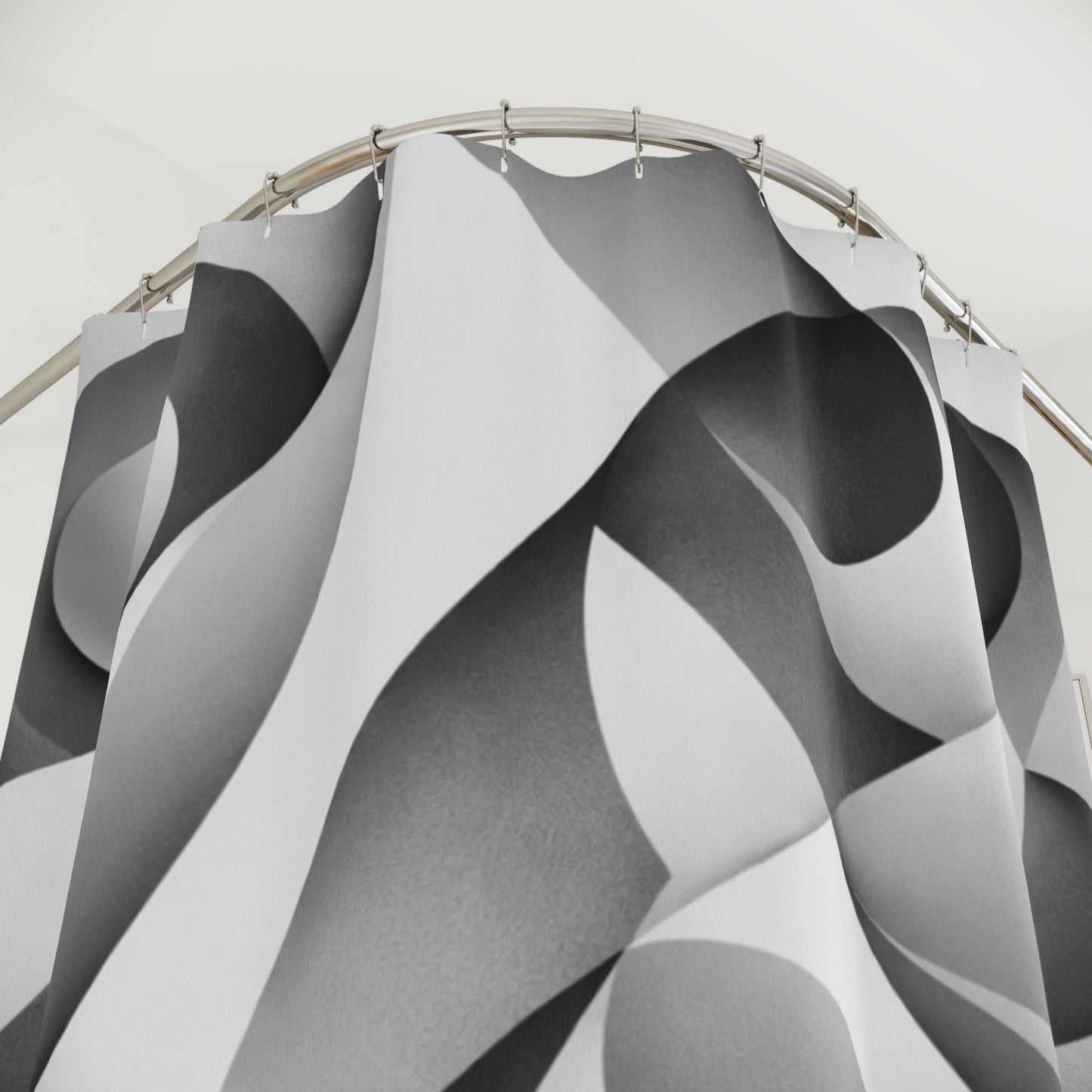 Black and white abstract geometric shower curtain with curved designs, ideal for modern home decor.