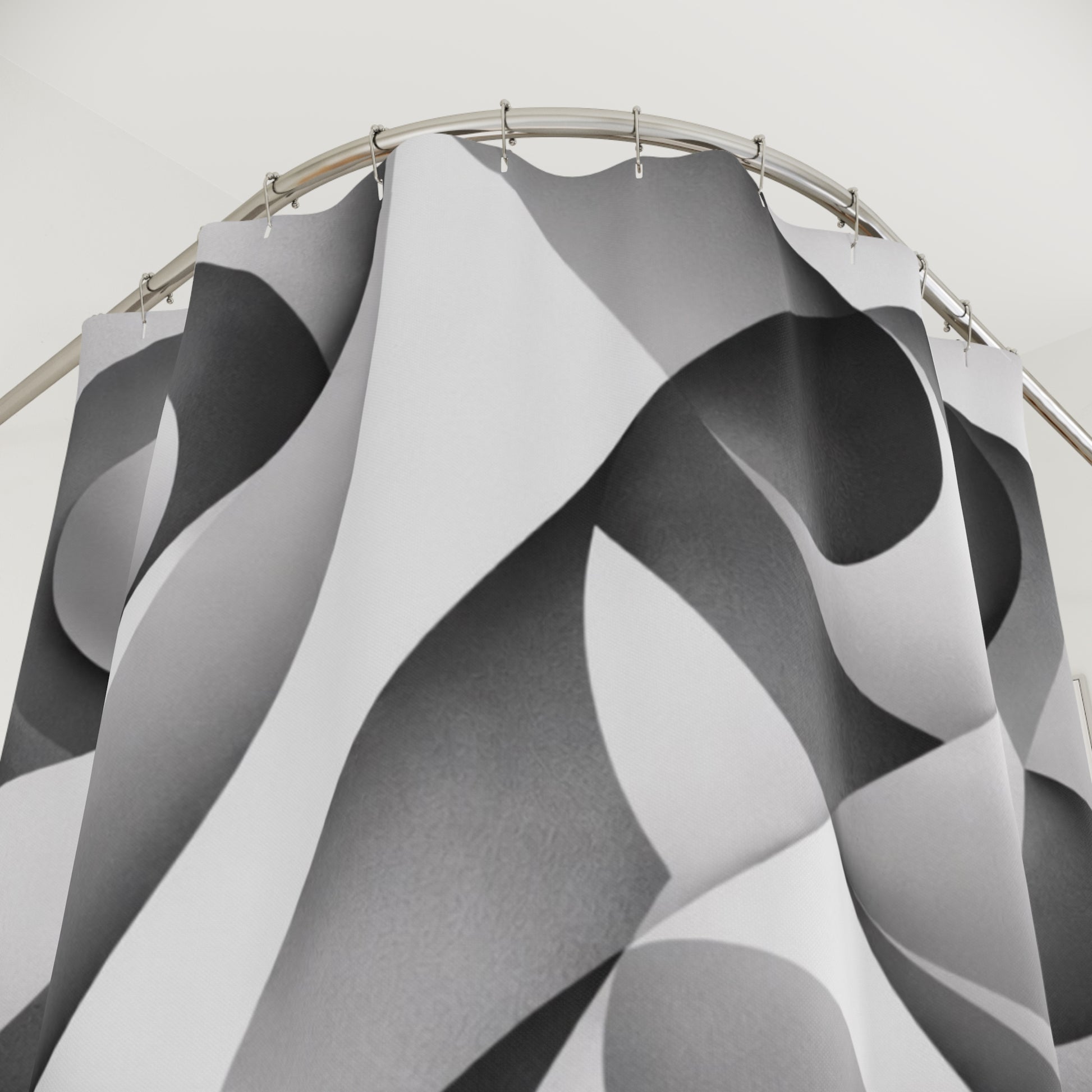 Black and white abstract geometric shower curtain with curved designs, ideal for modern home decor.