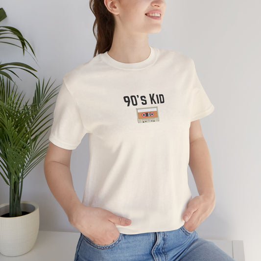 Printify 90's Kid Cassette T-Shirt featuring vibrant retro cassette tape graphic on a casual cotton tee for nostalgic style.