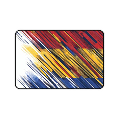 Colorful abstract flag brushstroke desk mat with red, yellow, and blue tones, ideal for gaming or office use by Printify.