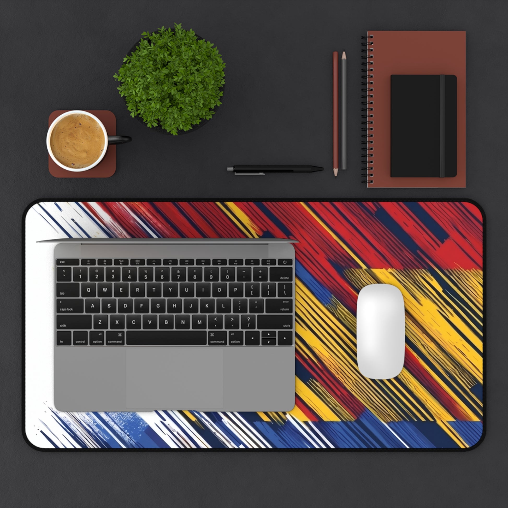 Colorful abstract flag brushstroke desk mat featuring red, yellow, and blue tones, designed for gaming or office use.