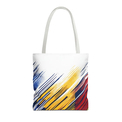 Abstract brushstroke tote bag with bold red, yellow, and blue all-over print, featuring a spacious design by Printify.